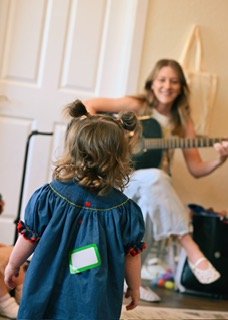 Chelsea leading a song with the children