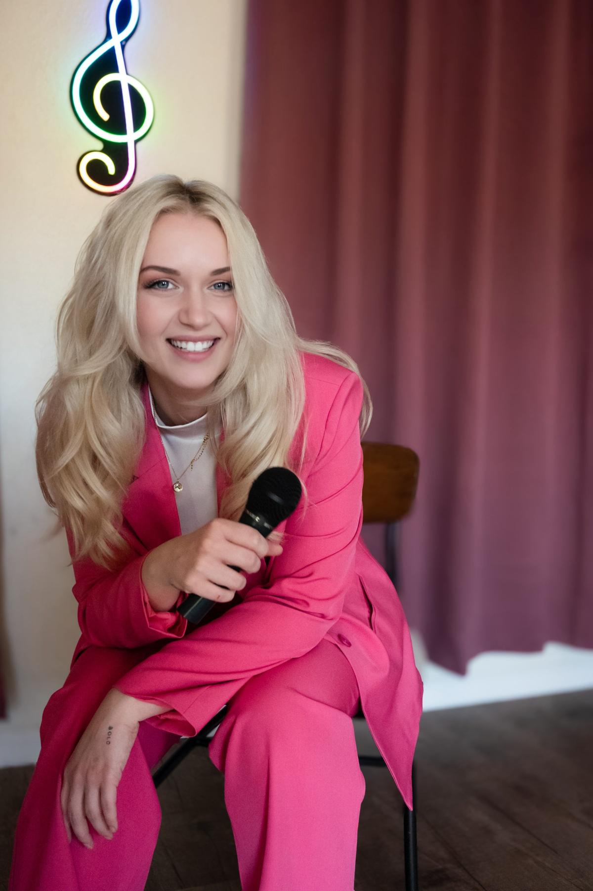 Baylee Scribner, founder of Baylee's Music Academy, in the studio