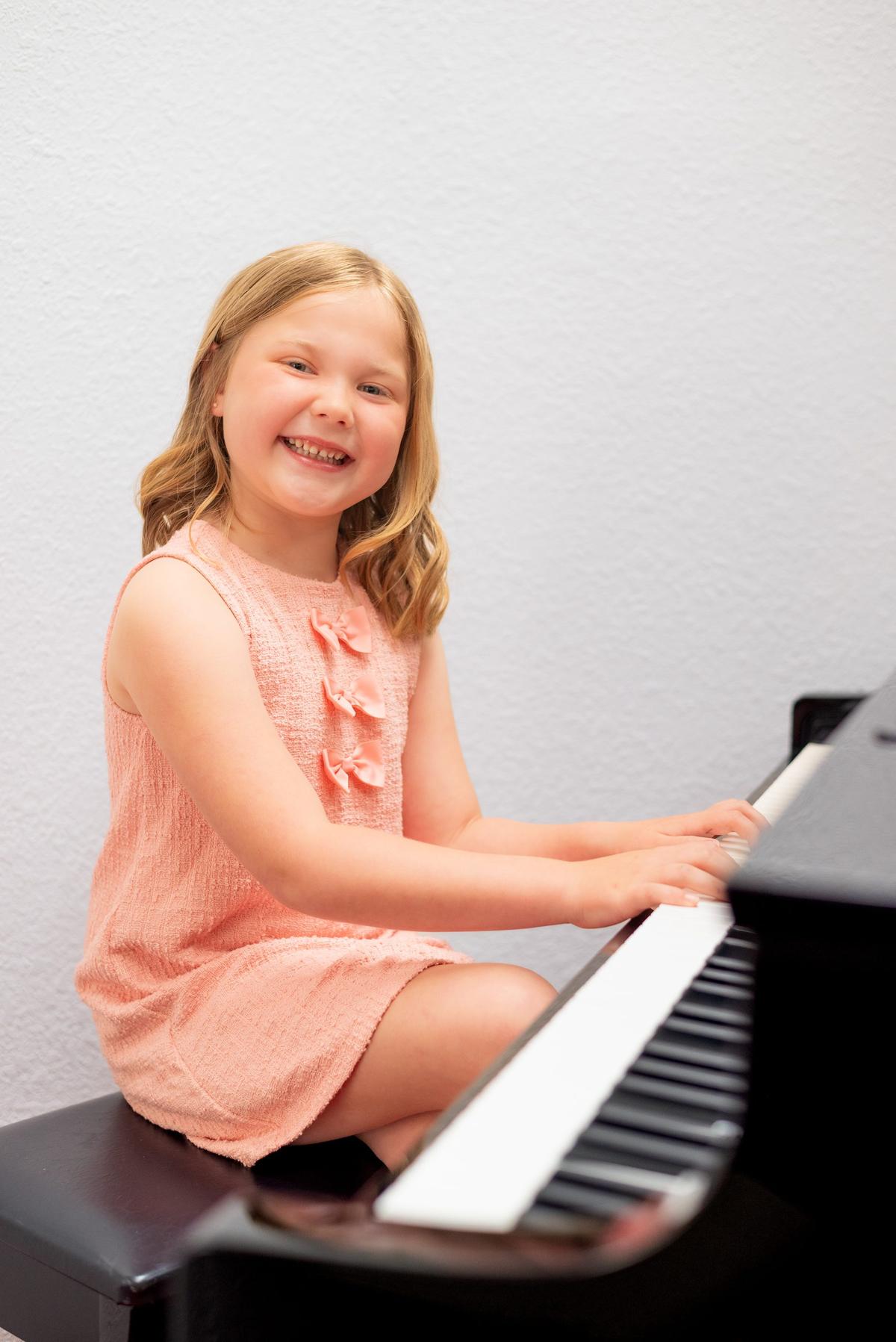 Young piano student at Baylee's Music Academy